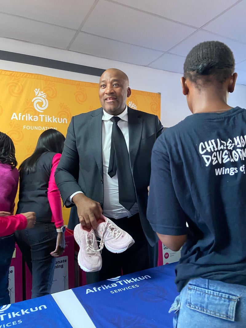 Discovery Vitality and Afrika Tikkun mark milestone moment with first running shoe handover in Diepsloot